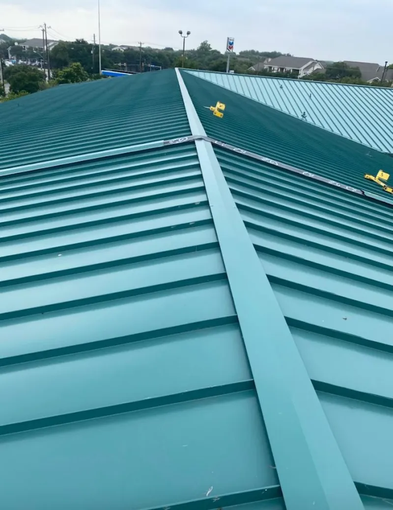 Green commercial metal roof ridge and valley for Metal Roof Repair in Collingswood
